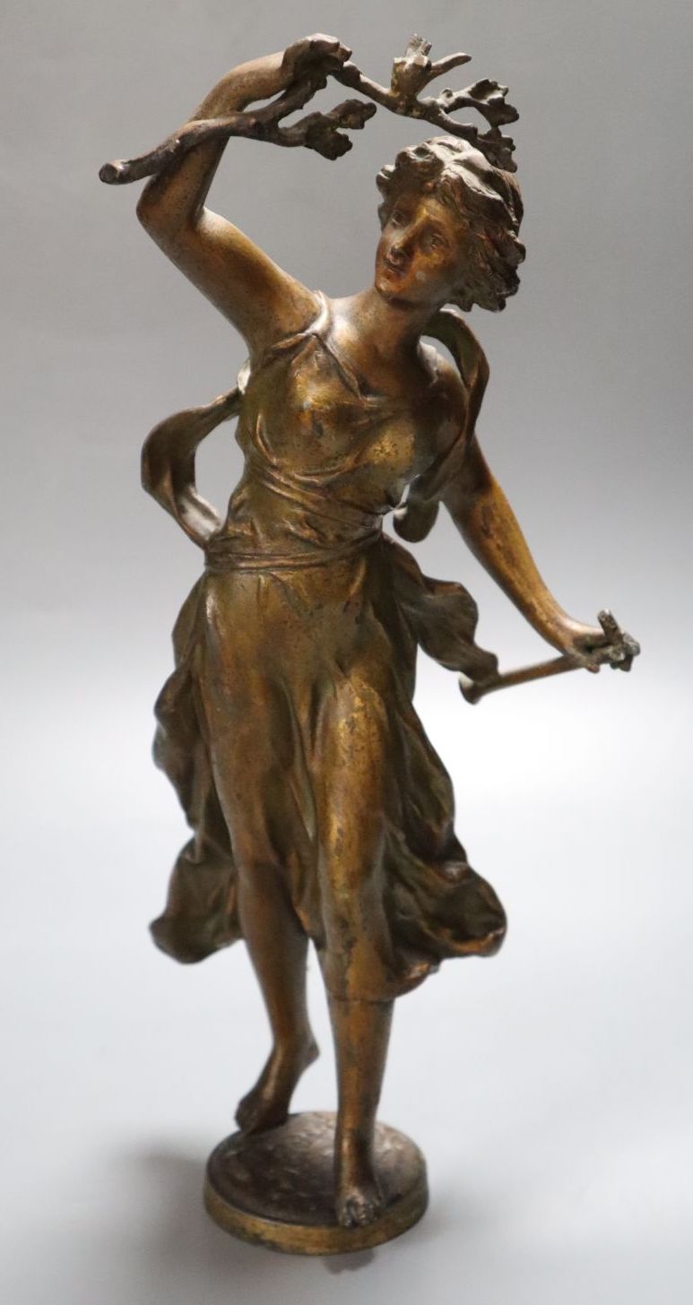 A 20th century spelter figure of Flora, height 34cm with associated stand